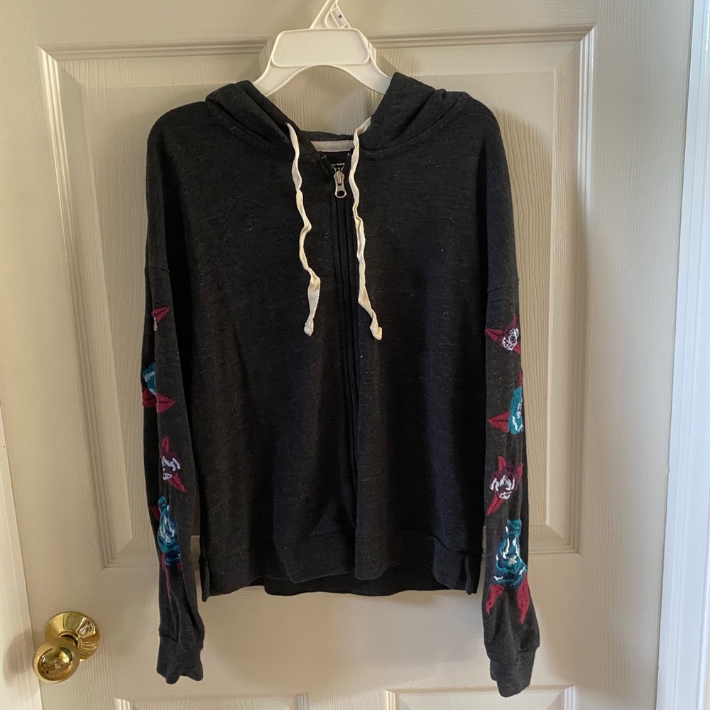 Grey zip up Sweater with floral design on sleeves